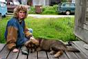 P0001351.jpg: Second Port Skagway Downtown Denise and her 6 month old dog.  The dog will grow to be 150 lbs.