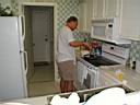 P1010243.jpg: Sean cooking more shrimp at the condo